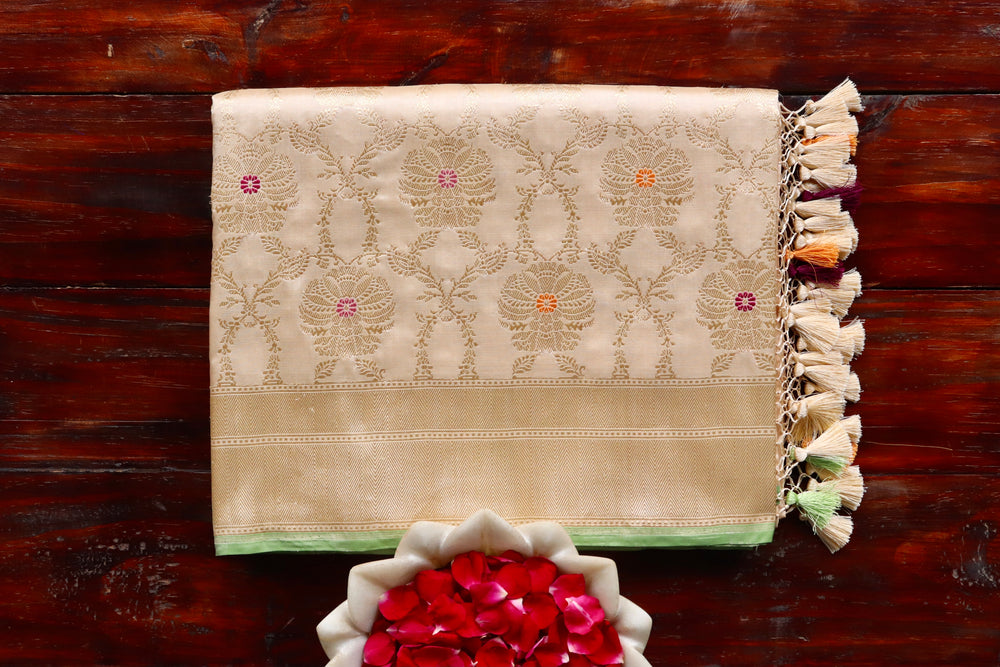 Cream handloom Banarsi saree with jangla motifs in pure silk