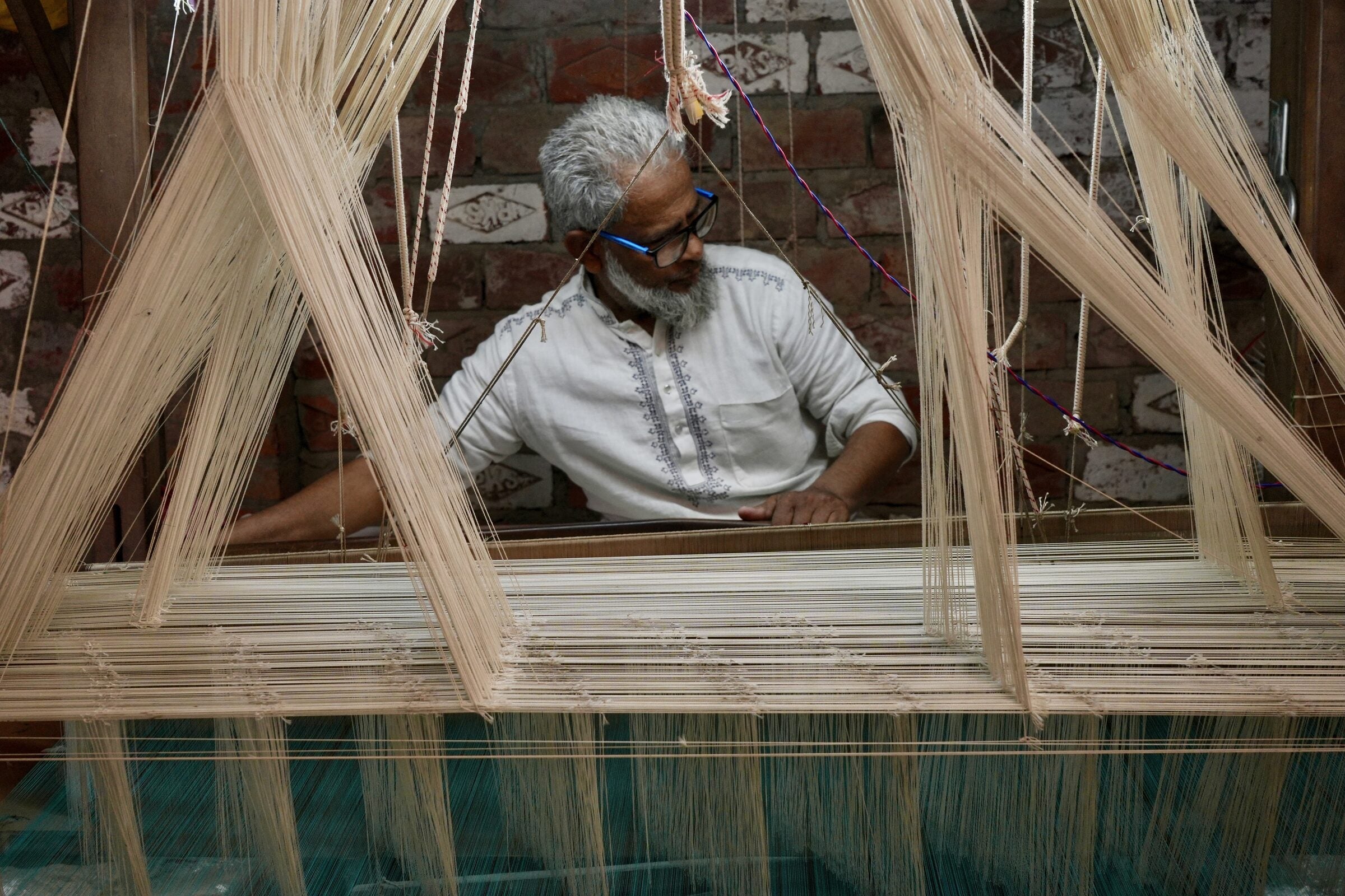 Master weaver at a handloom in Banaras