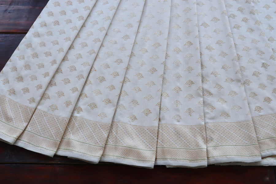 Pleat detail of Shwetambri Matsya Buti zari saree