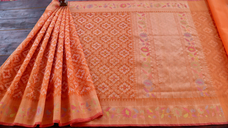 Border close-up on Bright Orange Kadhua Kora Banarasi saree