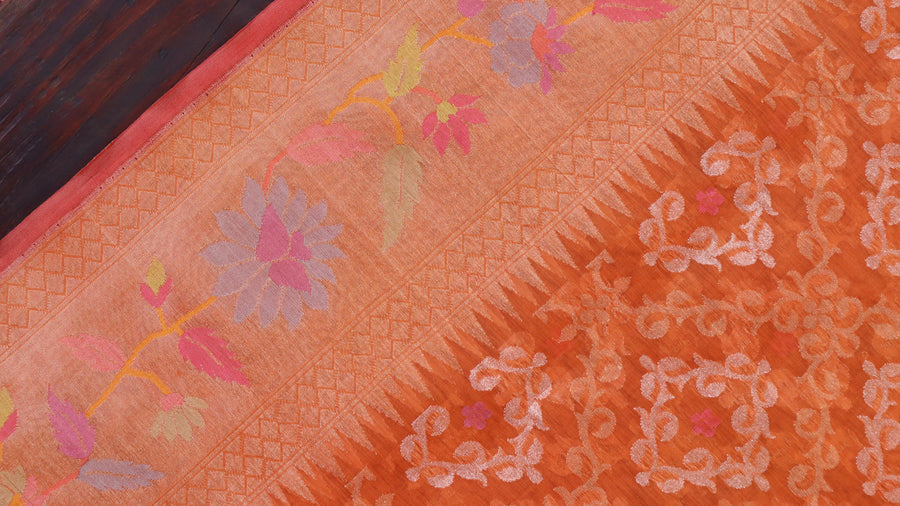 Aanchal motif on Bright Orange Kadhua Kora saree