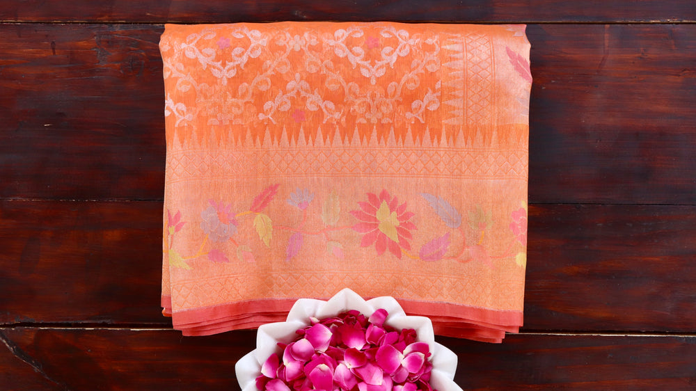 Orange handloom Banarsi saree with kadhua motifs in pure Kora silk