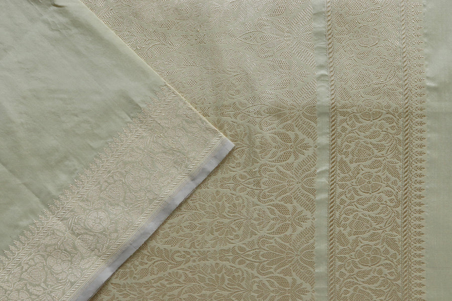 Full drape of Cream Green Motif pure silk Banarasi saree