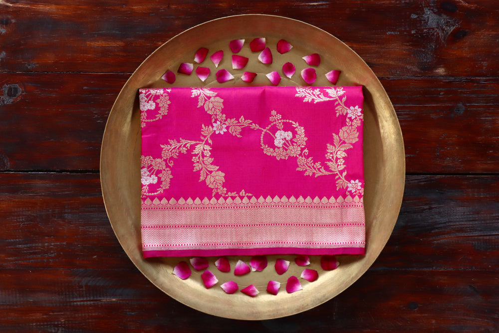 Bright Pink pure Katan silk Banarasi dupatta with scrolling vines and florals in continuous Jangla layout.
