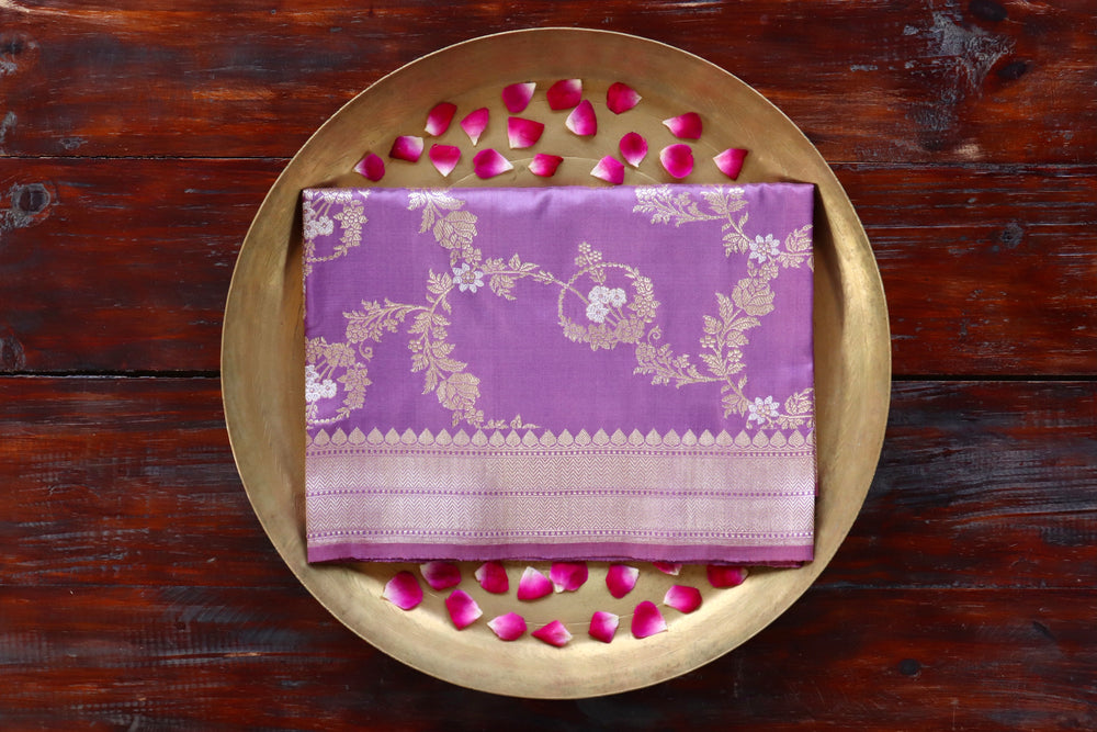 Lilac pure Katan silk Banarasi dupatta with scrolling vines and florals in continuous Jangla layout.