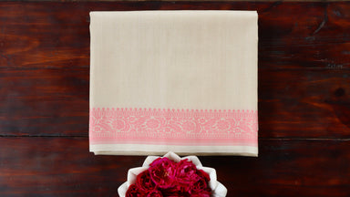 Cream handloom Banarsi saree with kadhua motifs in pure silk