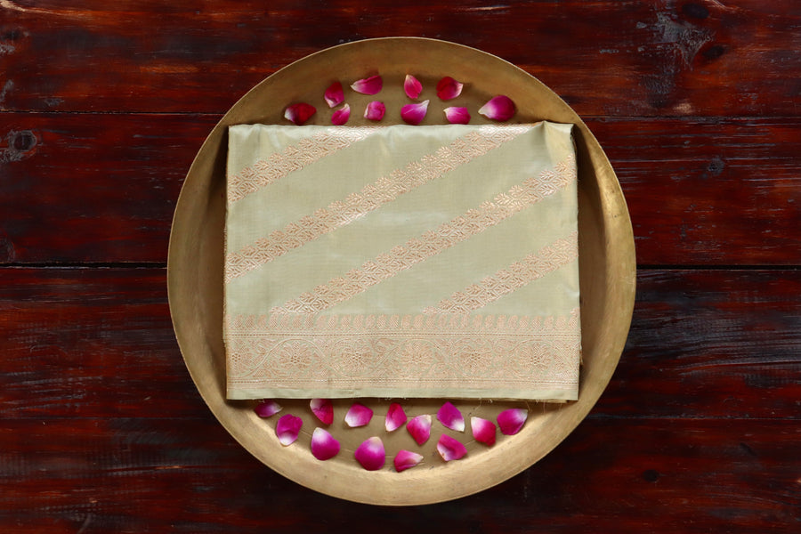 Pistachio Green Adda pure Katan silk Banarasi dupatta with scrolling vines and florals in continuous Jangla layout.