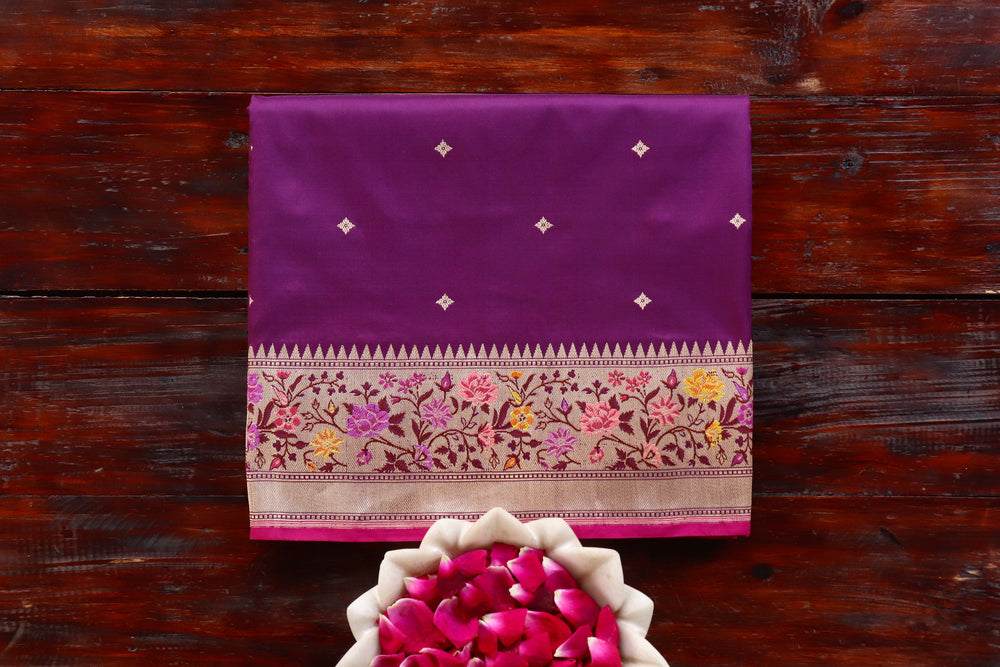 Purple pure Katan silk Banarasi saree with meenakari motifs in coloured silk and zari, draped for the camera.