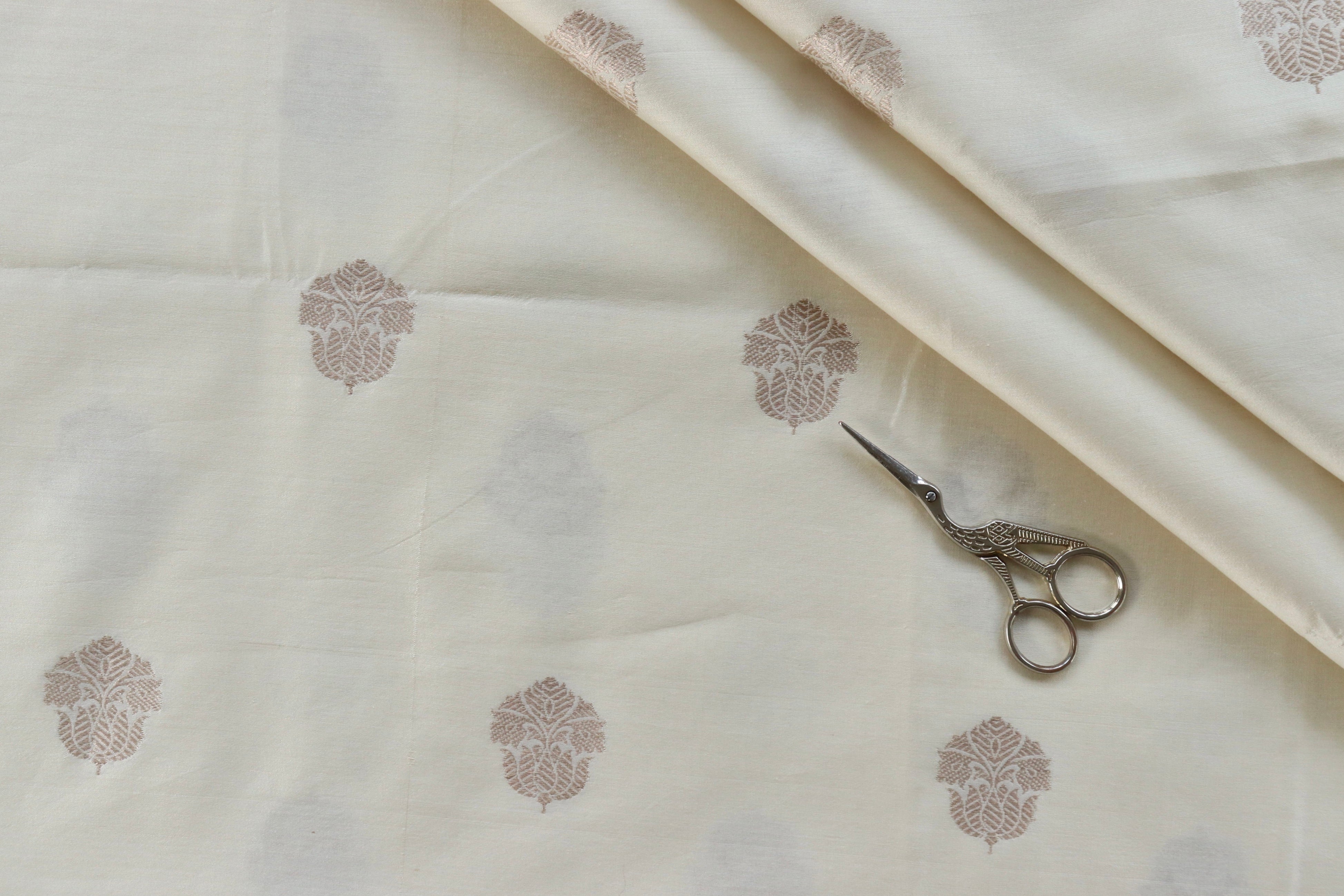 White Floral Motif Silk By Cotton Handloom Fabric Thaan