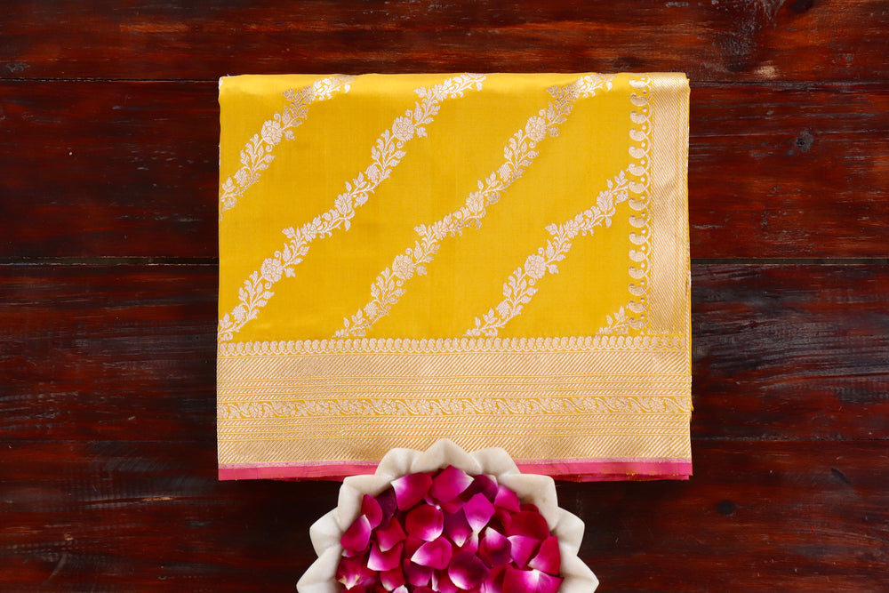 Yellow handloom Banarsi saree with jangla motifs in pure Katan silk