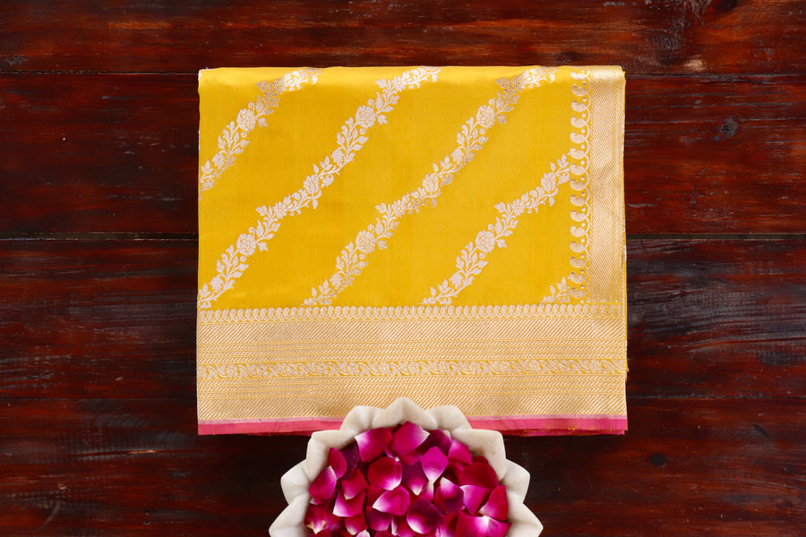 Yellow handloom Banarsi saree with jangla motifs in pure Katan silk