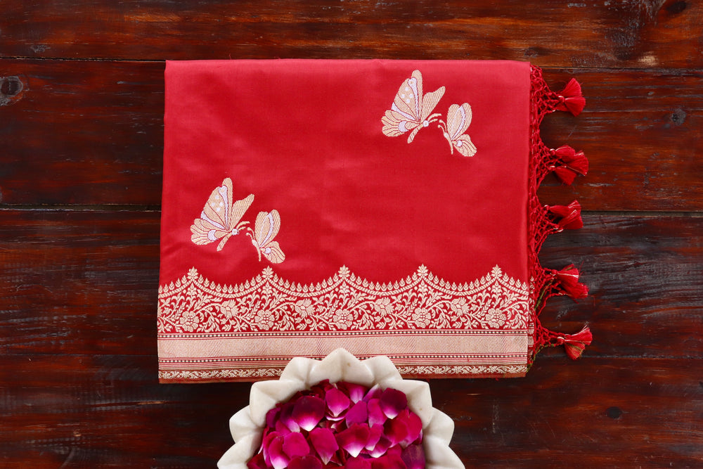 Red Butterfly pure Katan silk Banarasi saree with thread-by-thread motifs, draped for the camera.