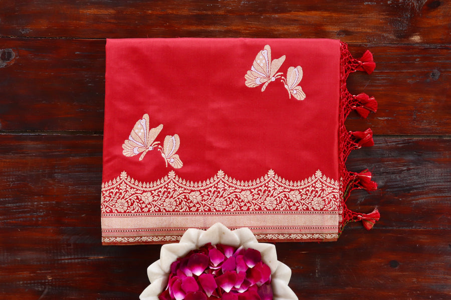 Red Butterfly pure Katan silk Banarasi saree with thread-by-thread motifs, draped for the camera.