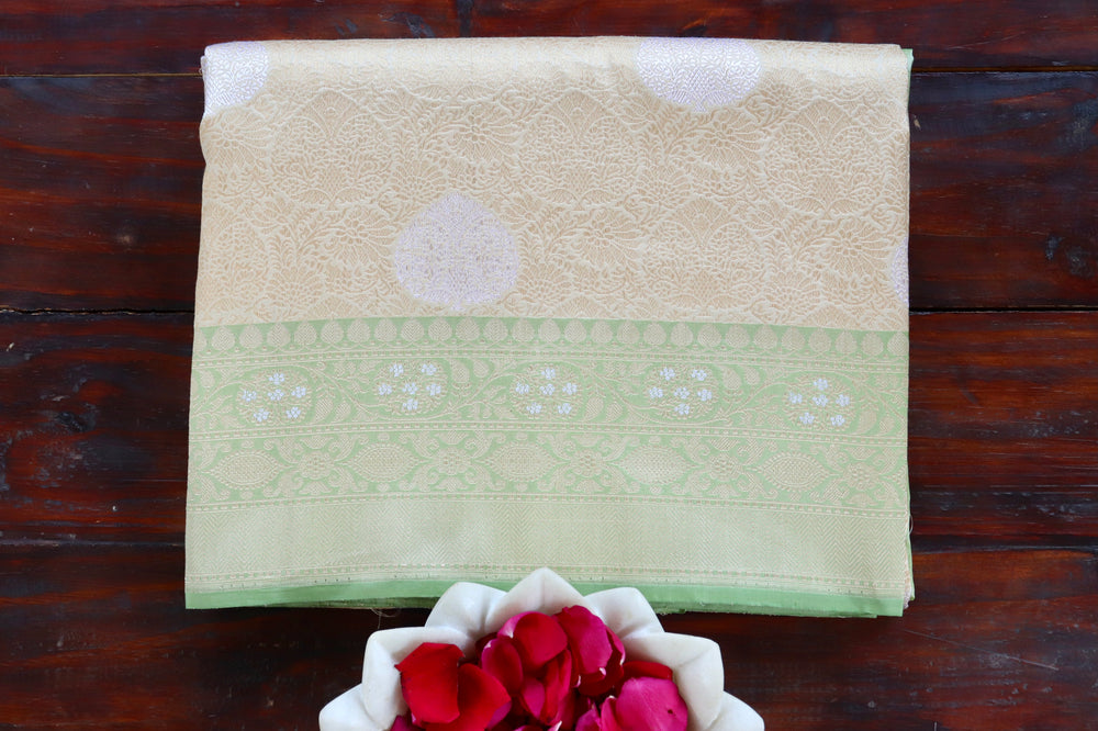 Ivory handloom Banarsi saree with tanchoi motifs in pure silk