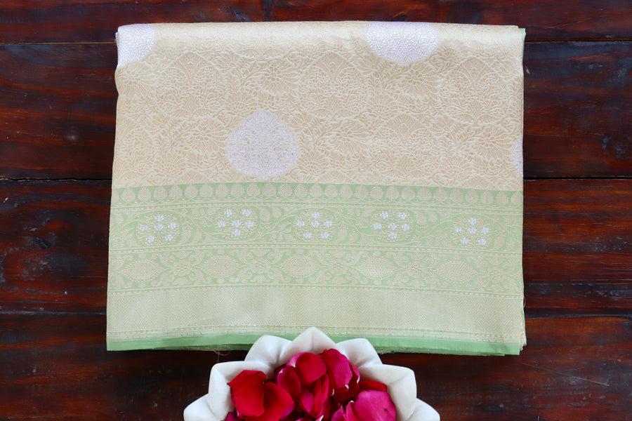 Ivory handloom Banarsi saree with tanchoi motifs in pure silk