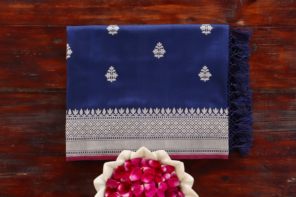 Navy Blue Leaf Katan silk Banarasi saree with thread-by-thread motifs, draped for the camera.