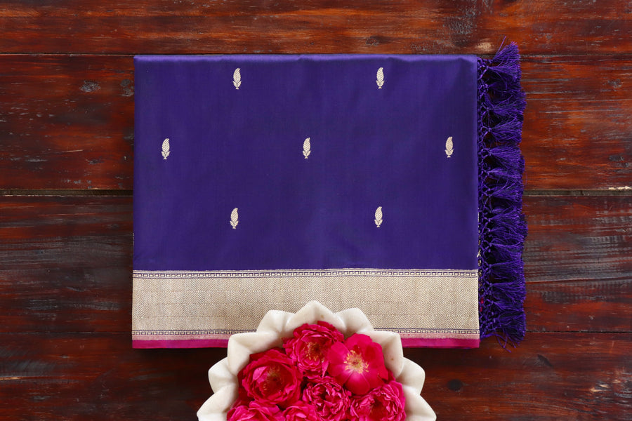 Navy Blue pure Katan silk Banarasi saree with Kairy paisley motifs, draped for the camera.