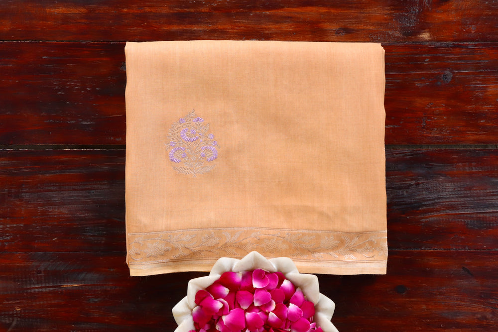 Sandalwood Munga silk Banarasi saree with thread-by-thread motifs, draped for the camera.