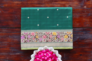 Green handloom Banarsi saree with kadhua motifs in pure silk