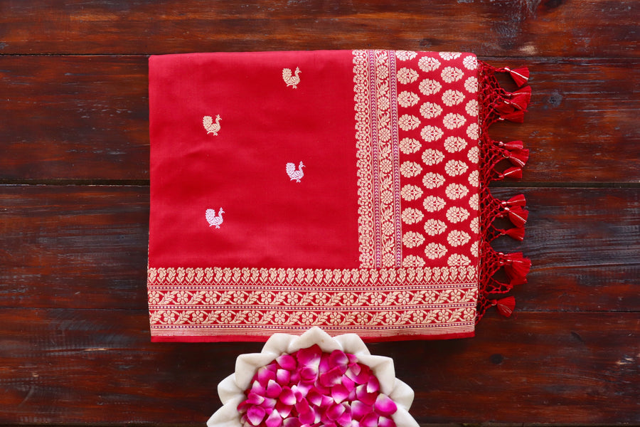 Red handloom Banarsi saree with peacock motifs in pure silk