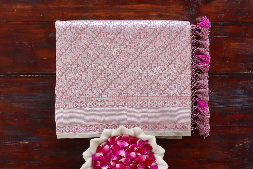 Powder Pink pure Katan silk Banarasi saree with meenakari motifs in coloured silk and zari, draped for the camera.