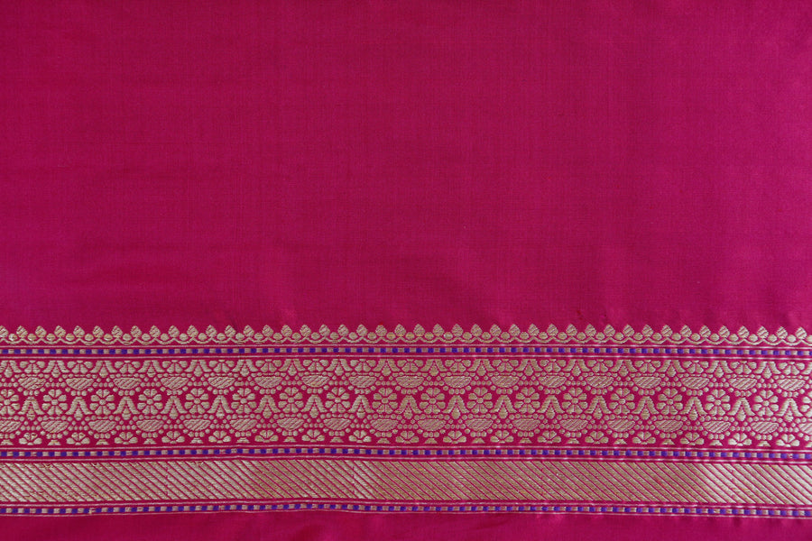 Pure zari motif on Magenta handwoven Banarasi silk saree