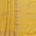 Yellow Munga Munga silk Banarasi suit set with thread-by-thread motifs.