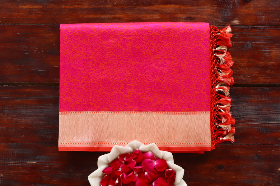 Pink Butterfly Katan silk Banarasi saree with densely packed Tanchoi motifs, draped for the camera.