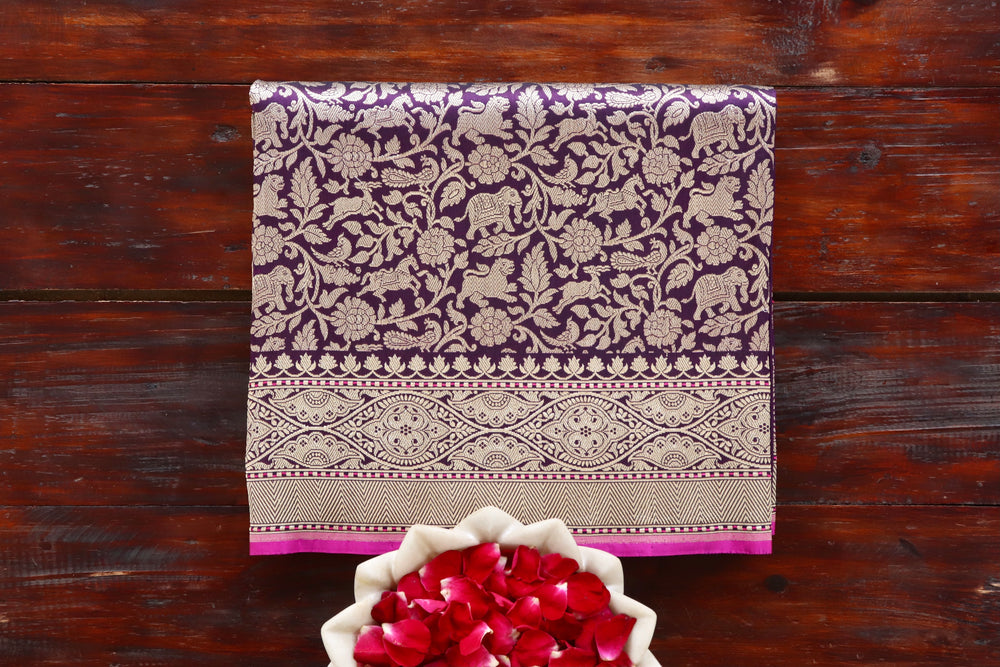 Purple handloom Banarsi saree with shikargah motifs in pure silk