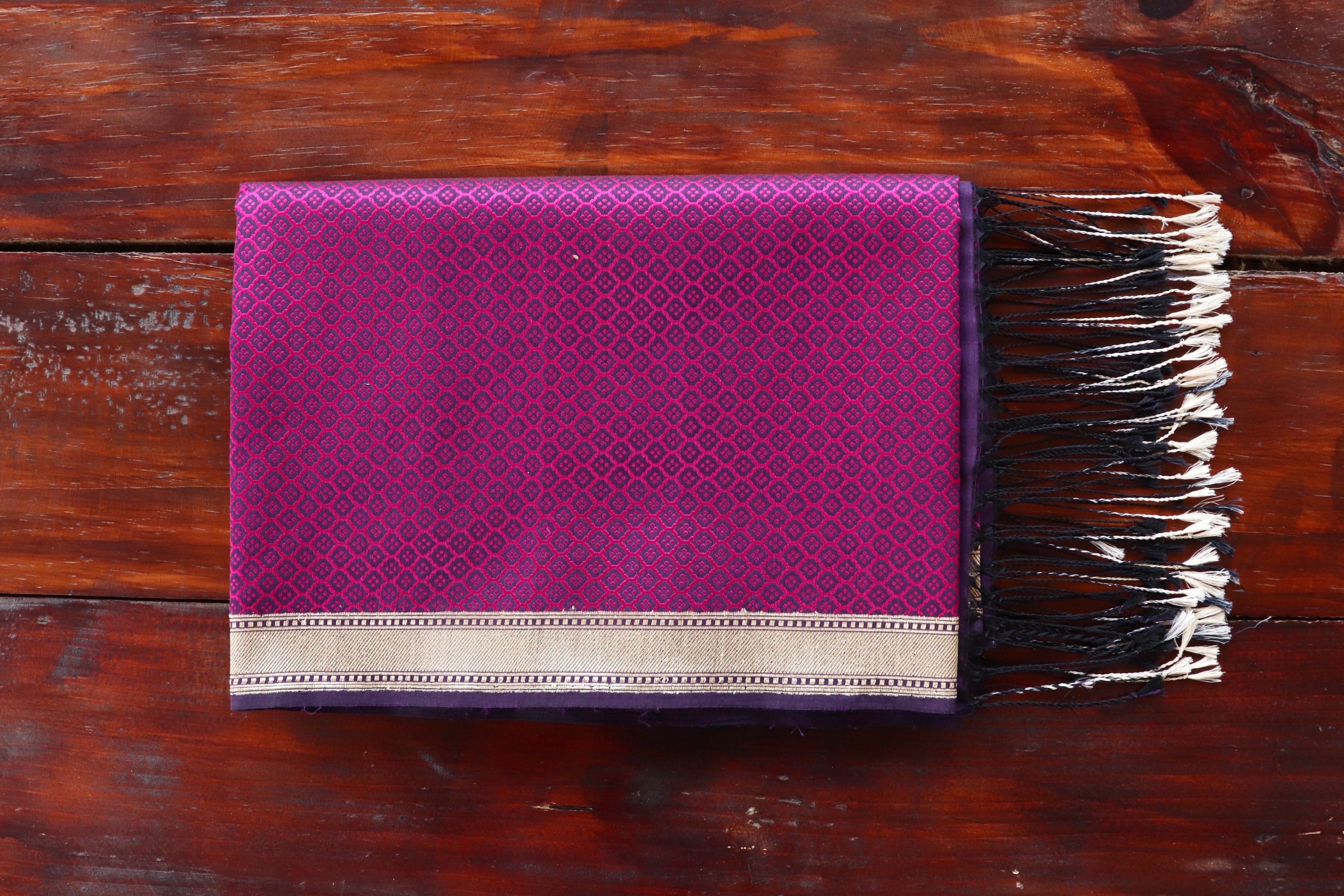 Purple Katan silk Banarasi stole with densely packed Tanchoi motifs.