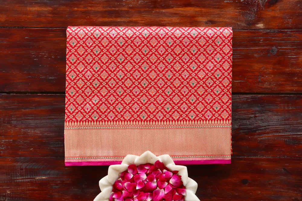 Red handloom Banarsi saree with tanchoi motifs in pure silk