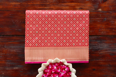 Red handloom Banarsi saree with tanchoi motifs in pure silk