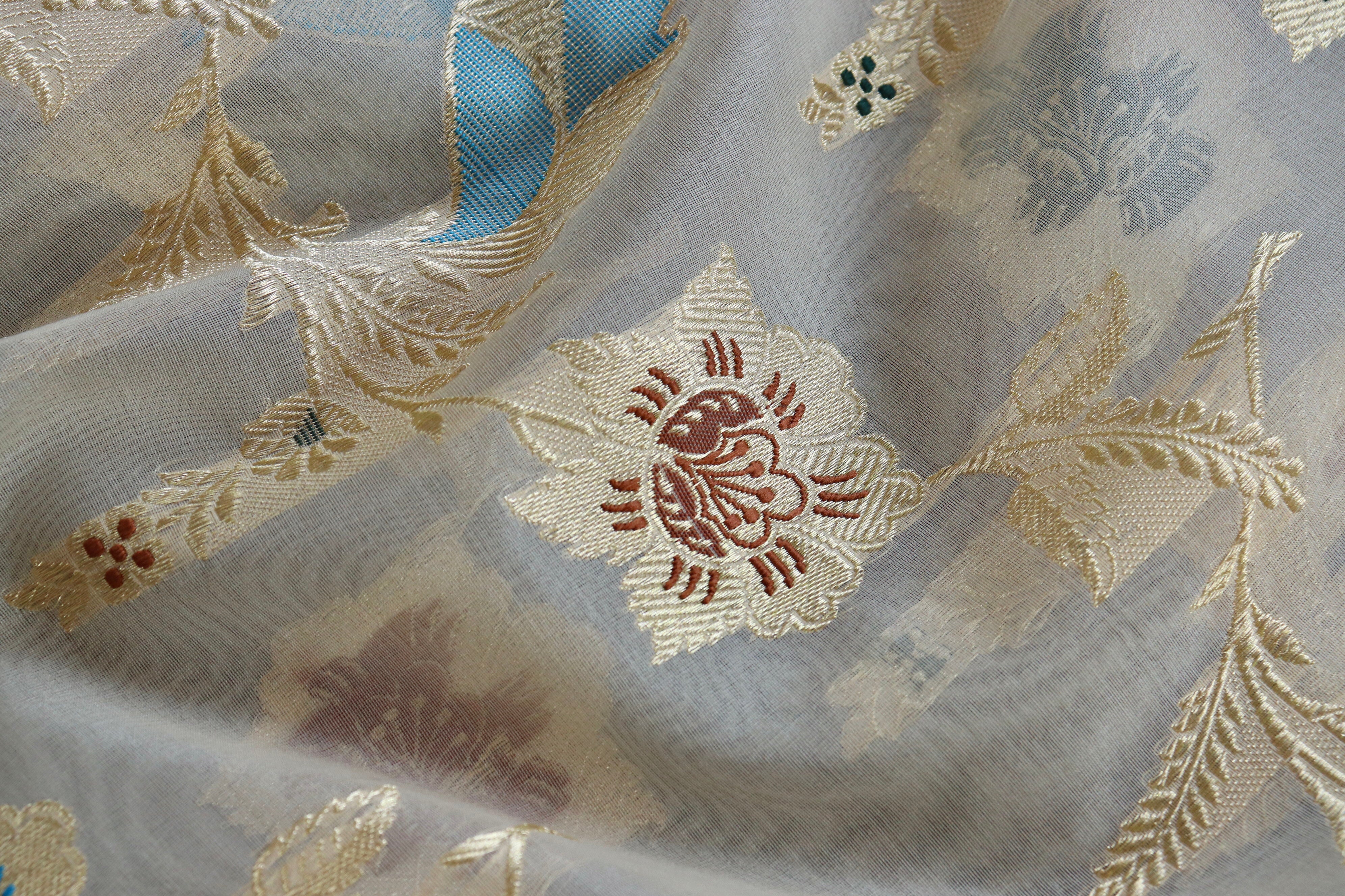 Beige Kadhua Jangla Handwoven Kora Saree