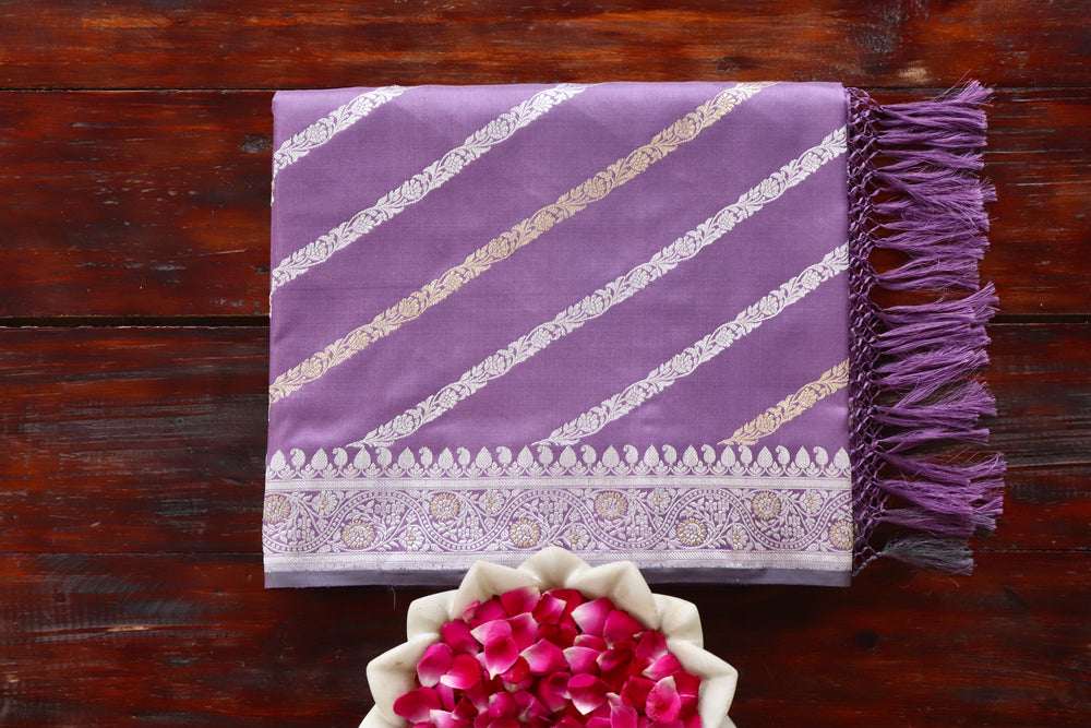 Purple handloom Banarsi saree with jangla motifs in pure Katan silk
