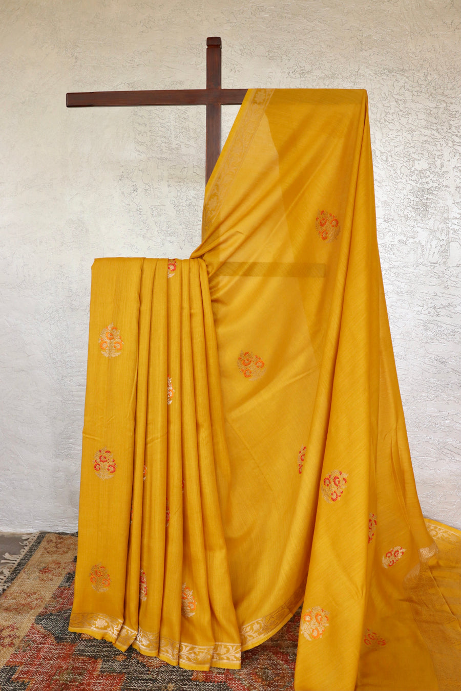 Yellow handloom Banarsi saree with kadhua motifs in Munga silk