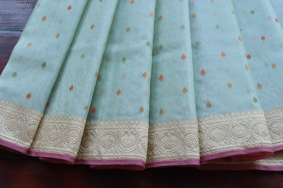 Kadhua motif on Light Green Kora Banarasi saree