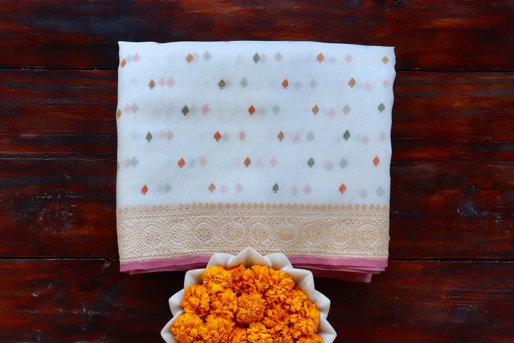 White handloom Banarsi saree with kadhua motifs in pure Kora silk