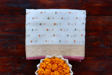 White handloom Banarsi saree with kadhua motifs in pure Kora silk