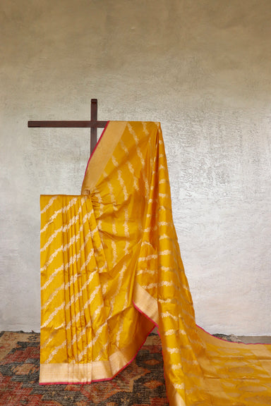 Yellow handloom Banarsi saree with jangla motifs in pure Katan silk