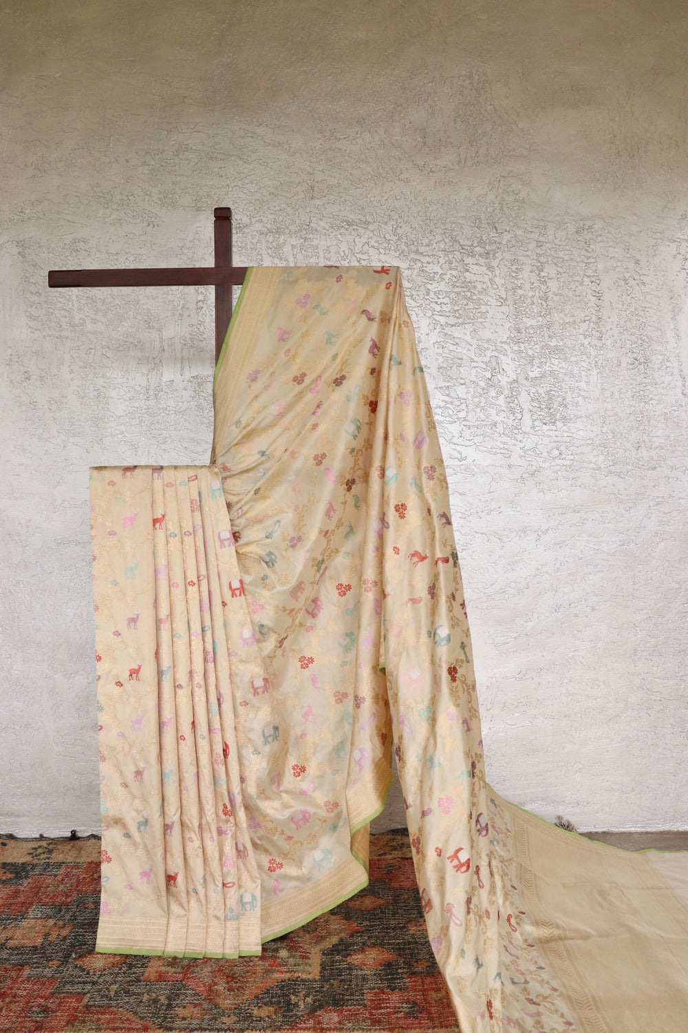 Ivory handloom Banarsi saree with kadhua motifs in pure silk