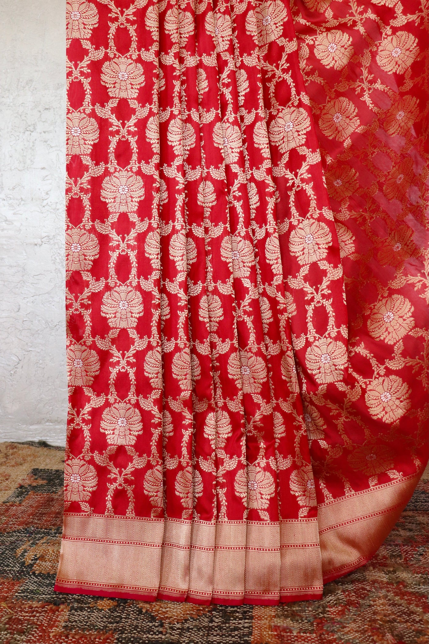 Red handloom Banarsi saree with jangla motifs in pure silk