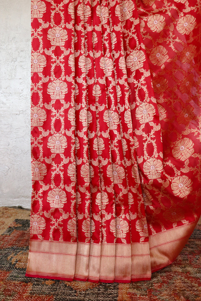 Red handloom Banarsi saree with jangla motifs in pure silk