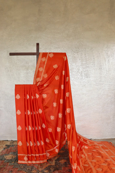 Rust handloom Banarsi saree with kadhua motifs in pure silk