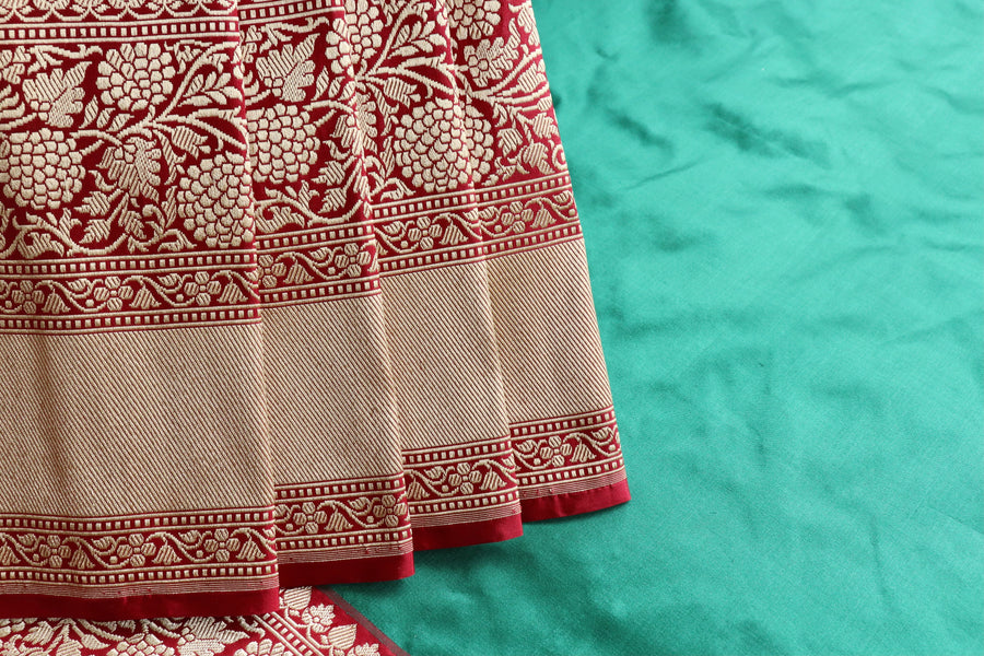 Pallu detail of Green & Maroon Kadhua Katan Banarasi saree