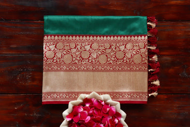 Green handloom Banarsi saree with kadhua motifs in pure Katan silk