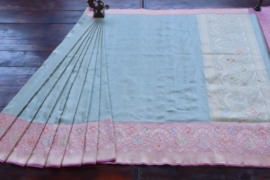 Border close-up on Pink with Sky Blue Tissue Kadiyal saree