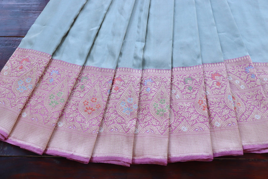 Meenakari motif close-up on Pink with Sky Blue Tissue saree