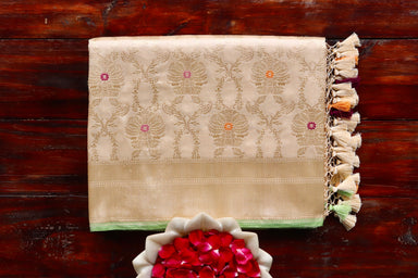 Cream handloom Banarsi saree with jangla motifs in pure silk