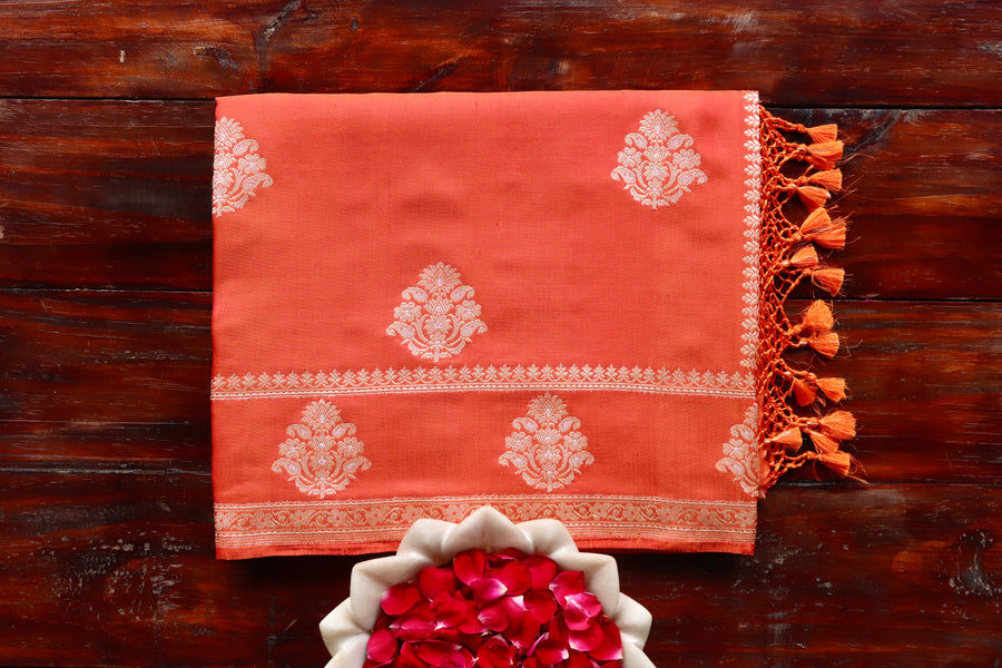 Rust handloom Banarsi saree with kadhua motifs in pure silk