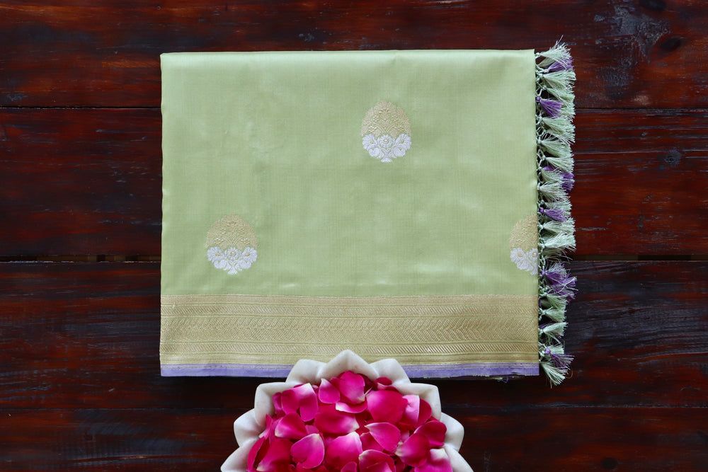 Pista Green handloom Banarsi saree with kadhua motifs in pure silk